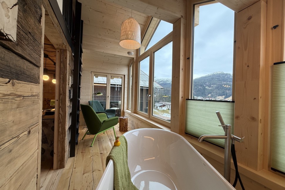 Ferienhaus mit private Spa im Kleinwalsertal mit Bergblick.
